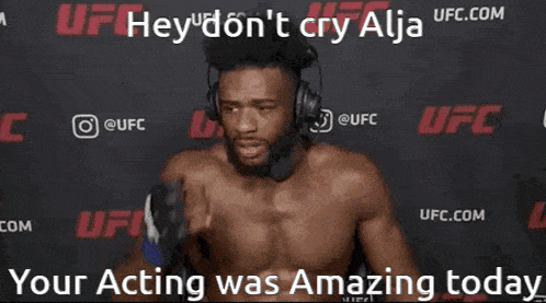 a shirtless man wearing headphones says " hey don 't cry alja "