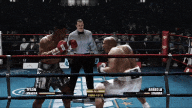 a boxing match between tyson and arreola with a score of 21 to 19
