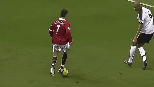 a soccer player in a red jersey with the number 7 on it