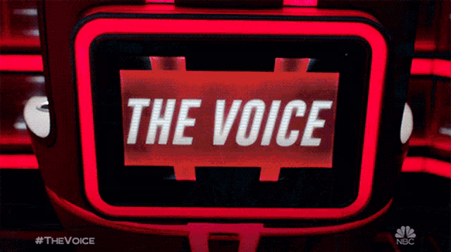 a sign that says the voice in white letters
