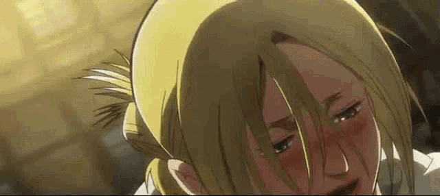 a close up of a person 's face with tears coming out of her eyes .