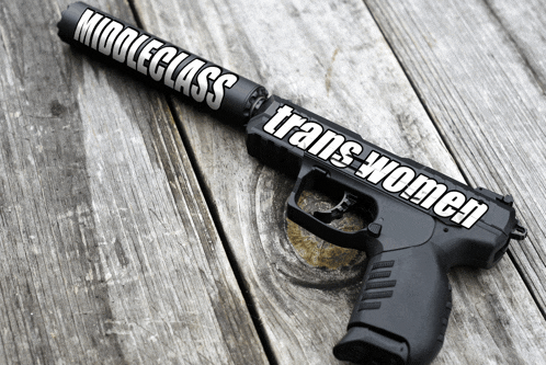 a black gun with a sticker on it that says middleclass trans women