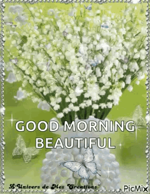 a bouquet of lily of the valley flowers in a vase with a butterfly .