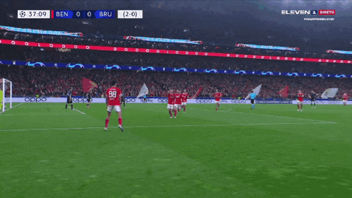 a soccer game is being played and the score is 2-0