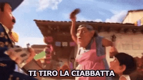 a cartoon scene with the words ti tiro la ciabatta in the upper right corner