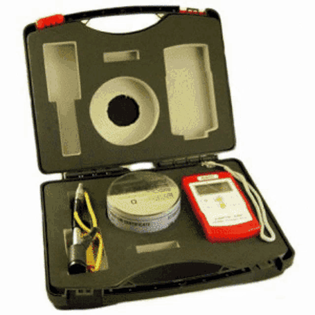 a black case with a red device in it