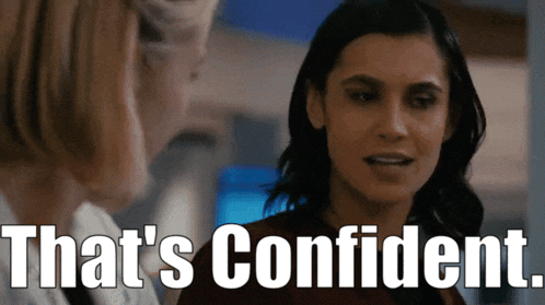 a woman is talking to another woman and the words that 's confident are above her