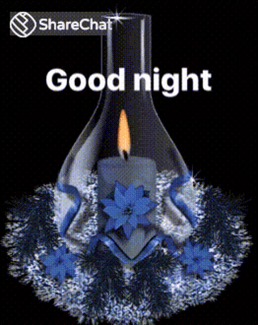 a candle in a vase with the words " good night " on it