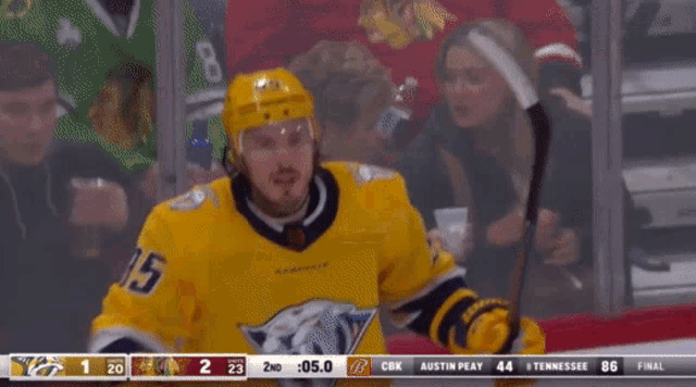 a hockey player wearing a jersey that says tennessee on it