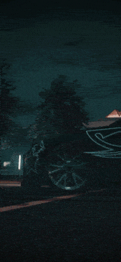 a blurry picture of a car driving down the road