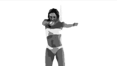 a woman in a bikini is dancing in front of a white background .