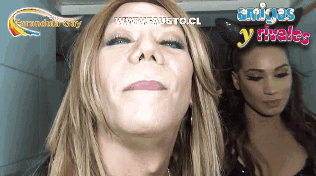 two women are standing next to each other with the words amigos y rivales behind them