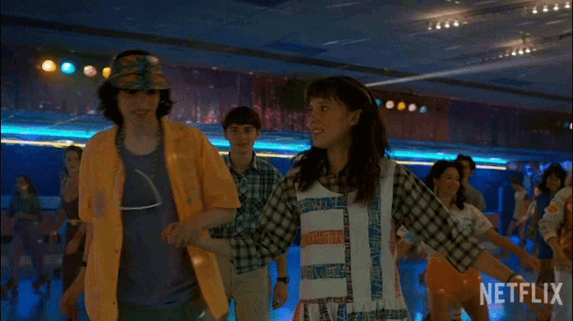 a group of people are rollerblading on a rink with a netflix logo in the corner