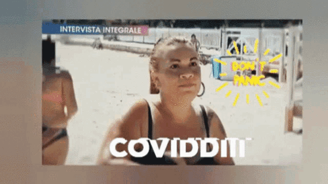 a woman in a bikini stands on a beach with the words coviddit written on the bottom