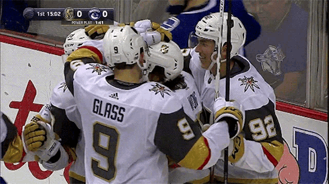 a hockey player with the name glass on the back