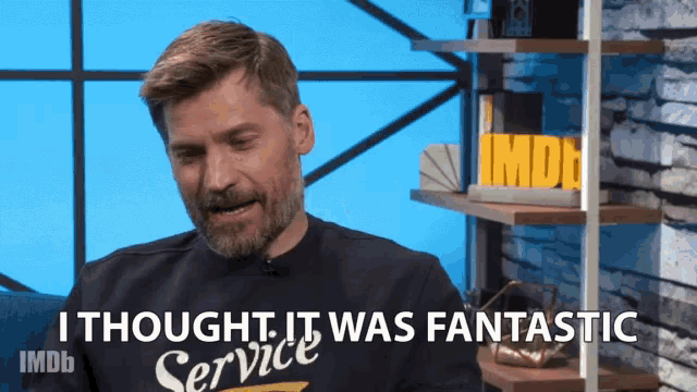 a man with a beard is wearing a shirt that says " service "