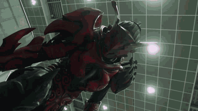 a red and black monster is flying through the air