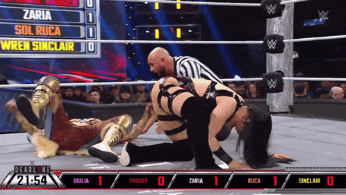a wrestling match between giulia and zaria