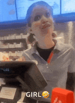 a woman behind a counter with the word girl on the bottom right