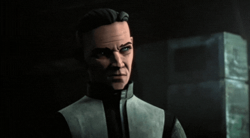 a close up of a man 's face with a serious look on his face