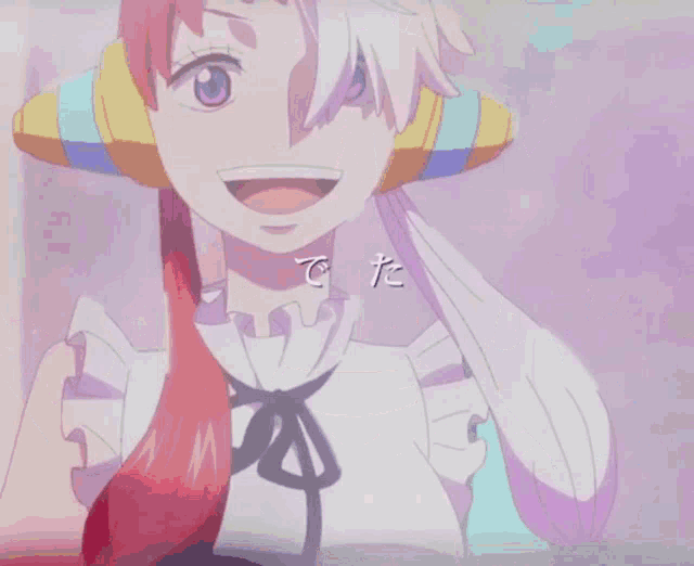 a girl with red hair and headphones is smiling