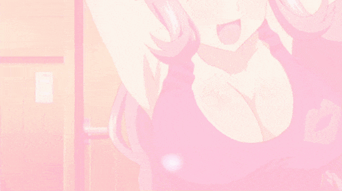 a close up of a woman 's breasts with a heart shaped light coming out of them