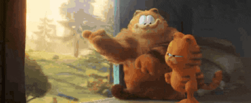 garfield and a smaller garfield are standing next to each other in front of a window .
