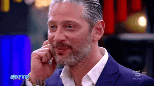a man with a beard is on a television show called # 9 vip