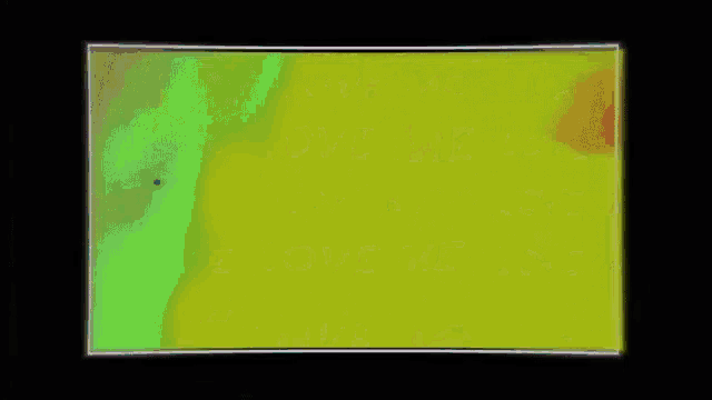 a colorful image of a person 's face is displayed on a screen