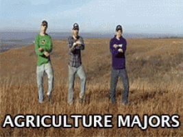three men are dancing in a field with the words agriculture majors written above them