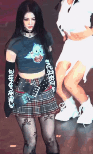 a woman wearing a crop top with the word chrome on the arm