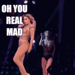 a woman is dancing on a stage with the words oh you real mad written on the bottom