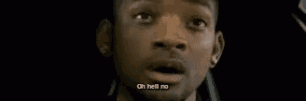 a close up of a man 's face with the words `` oh hell no '' written on his mouth .