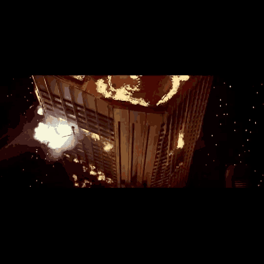 a pixelated image of a building with the letter g in the lower right corner