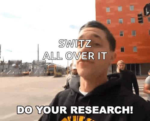 a man in a black hoodie says " do your research "