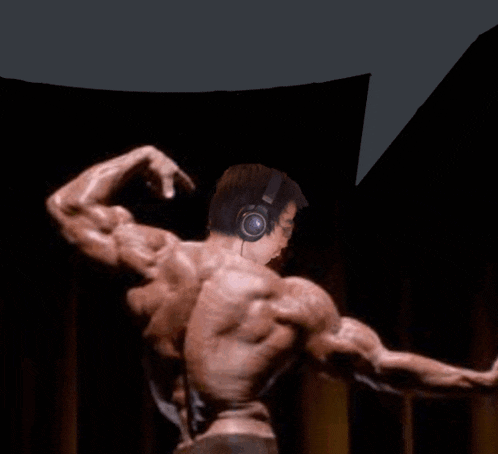 a bodybuilder wearing headphones flexes his muscles