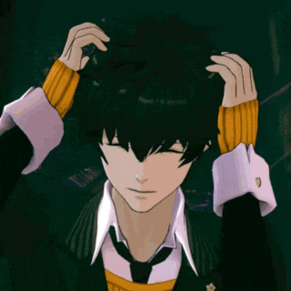 a man in a suit and tie has his eyes closed and his hands on his head