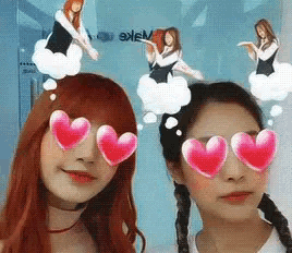 two girls wearing heart shaped glasses are standing next to each other in front of a sign that says " wake "