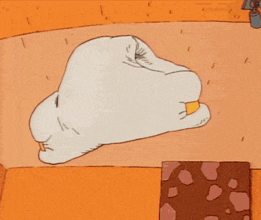 a cartoon character is holding a fist in his hand