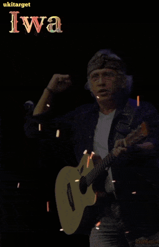 a poster for iwan fals shows a man holding a guitar in front of a microphone