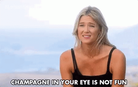 Champagne In Your Eye Is Not Fun Head Shake GIF - Champagne In Your Eye Is Not Fun Not Fun Head Shake GIFs