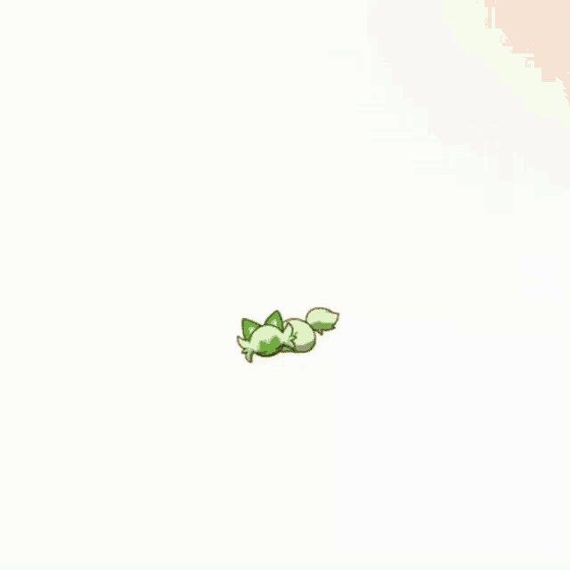 a person is holding a green cat in their hands with a music note above it