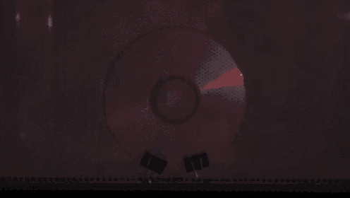 a cd with chinese writing on it is lit up
