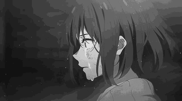 a black and white photo of a girl with tears running down her face