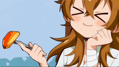 a girl with a bandage on her arm is holding a piece of food with a fork