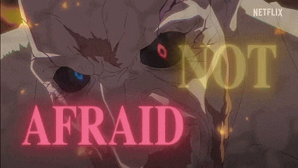 a close up of a person 's eye with the word afraid in pink letters