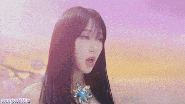 a group of girls standing next to each other with a watermark that says aespa gifs