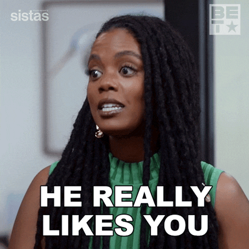 a woman says he really likes you while wearing a green shirt