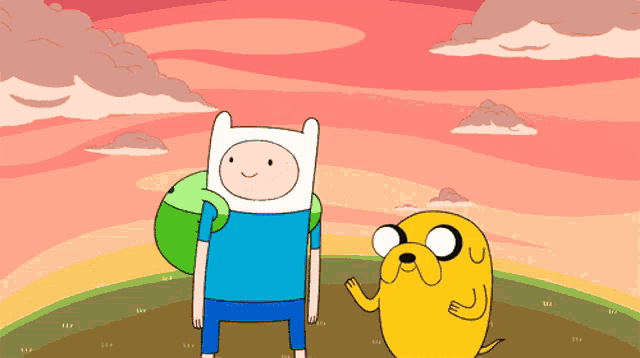a cartoon character named finn and a dog named jake are standing next to each other