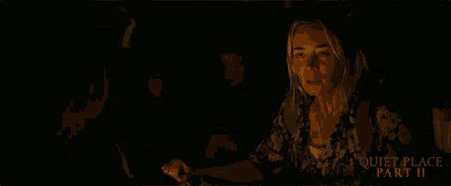 a poster for quiet place part ii features a woman